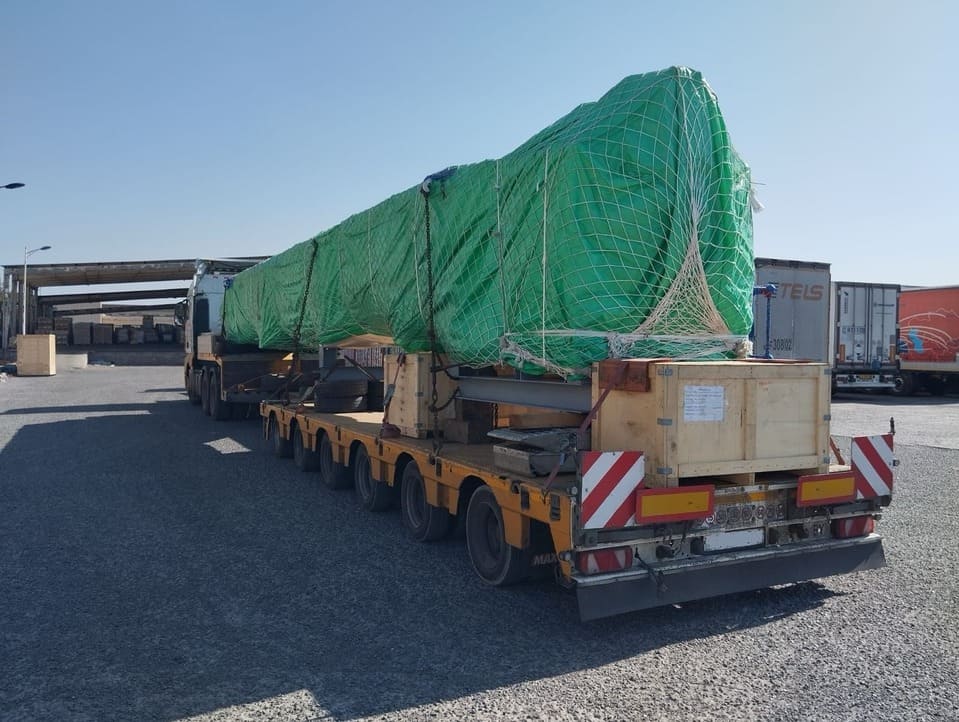 Транспортировка охлаждающего шнекового конвейера под тентом из Китая через пункт Алашанькоу